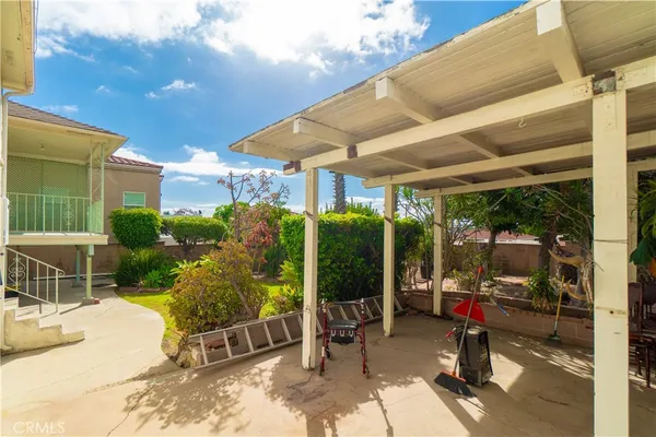 a view of a yard with an outdoor space