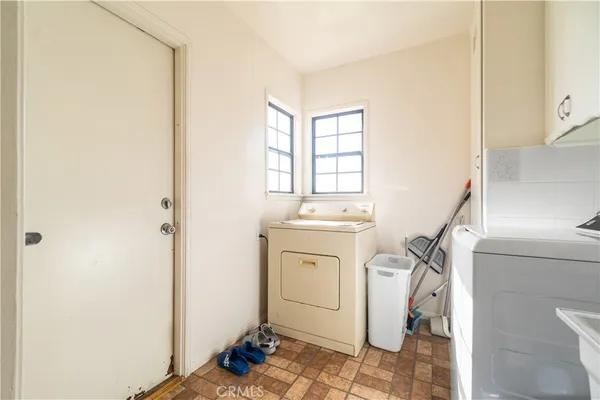 a room with a bed and a window