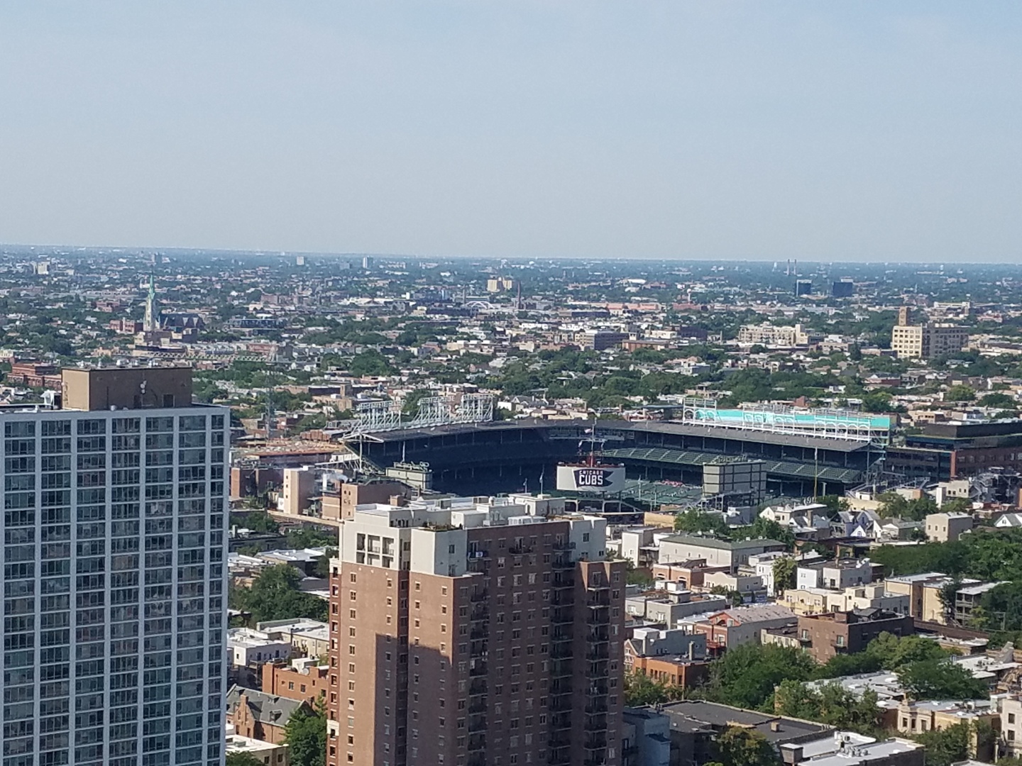 655 West Irving Park Road, Unit 3717 Chicago, IL 60613 - Photo 13 of 22 a view of a city with tall buildings