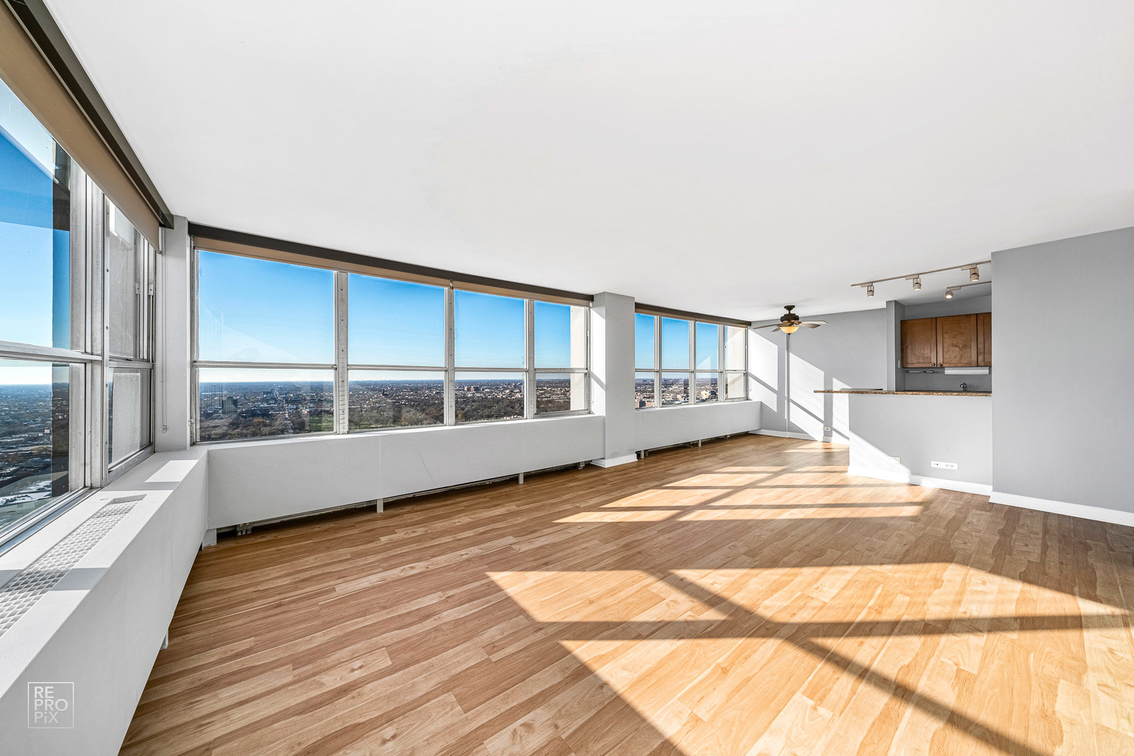 655 West Irving Park Road, Unit 3717 Chicago, IL 60613 - Photo 3 of 22 a view of a living room with a large window