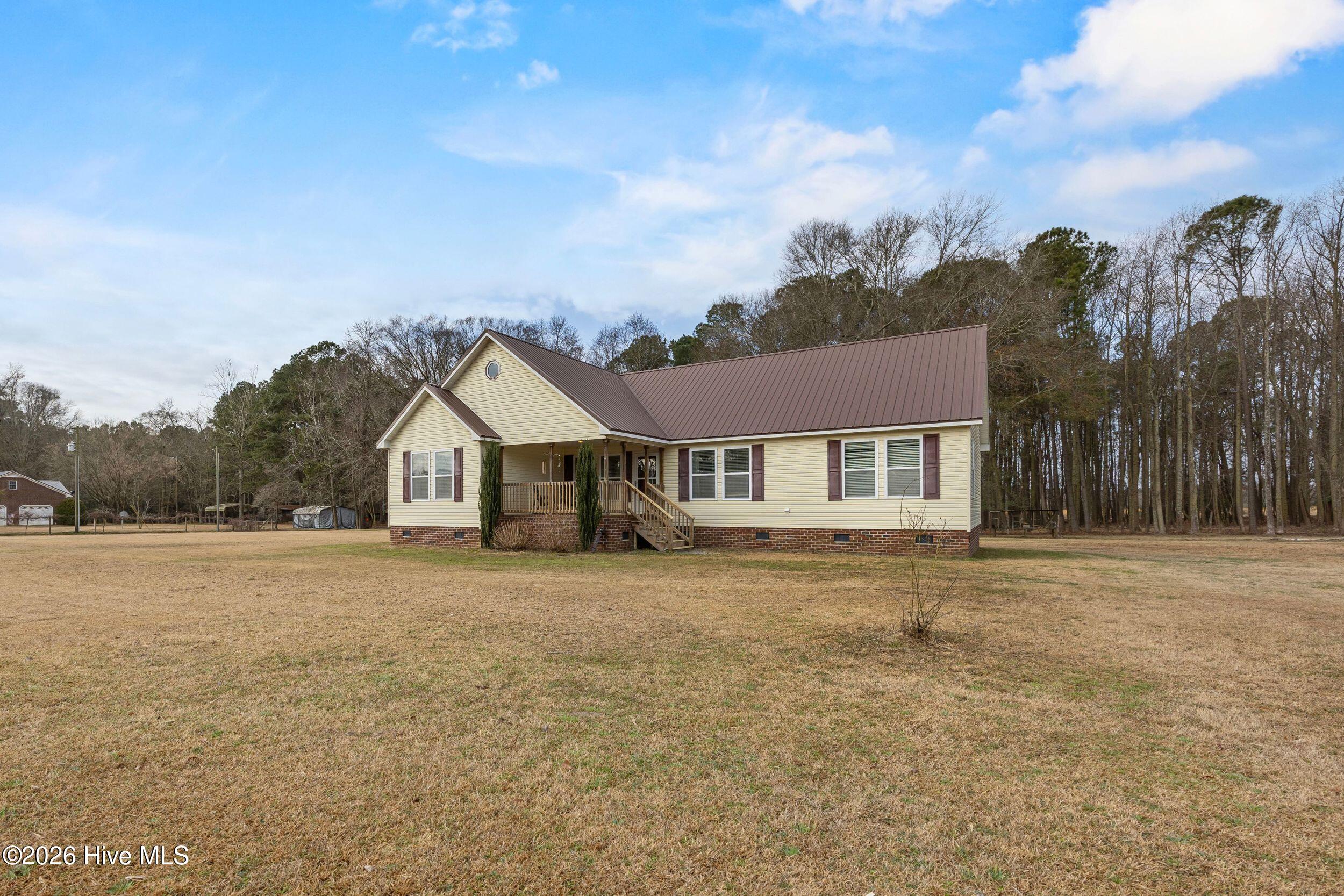 174 Teachey Mac Road Magnolia, NC 28453 - Photo 1 of 22 Front of home