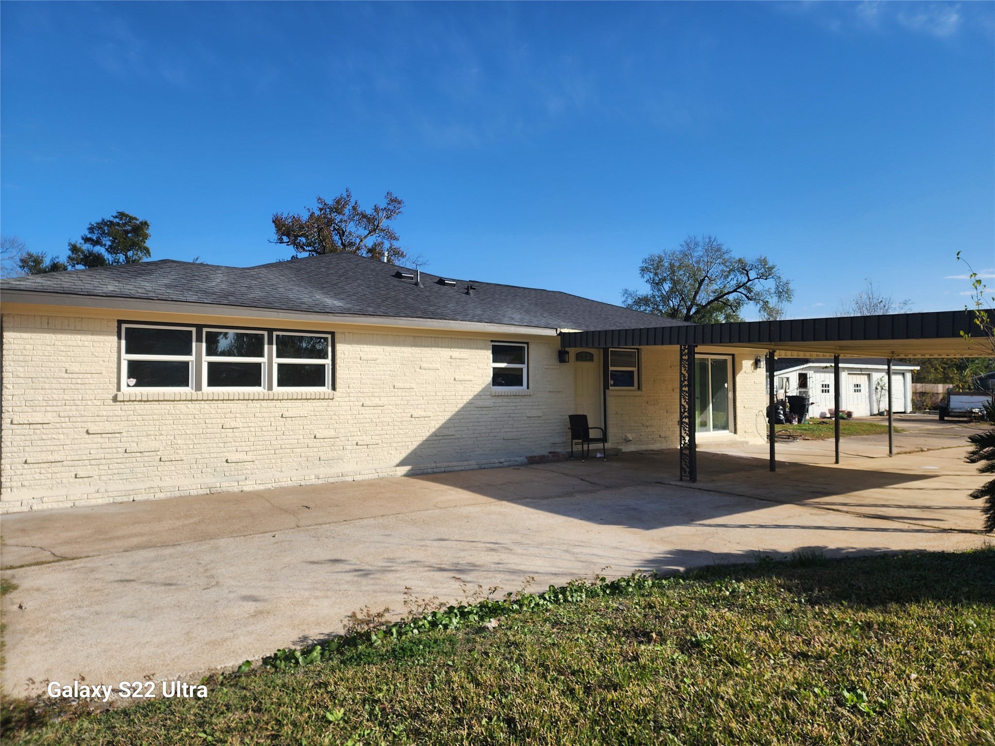 702 McDaniel Street, Unit A Houston, TX 77022 - Photo 10 of 11 a front view of a house with a yard