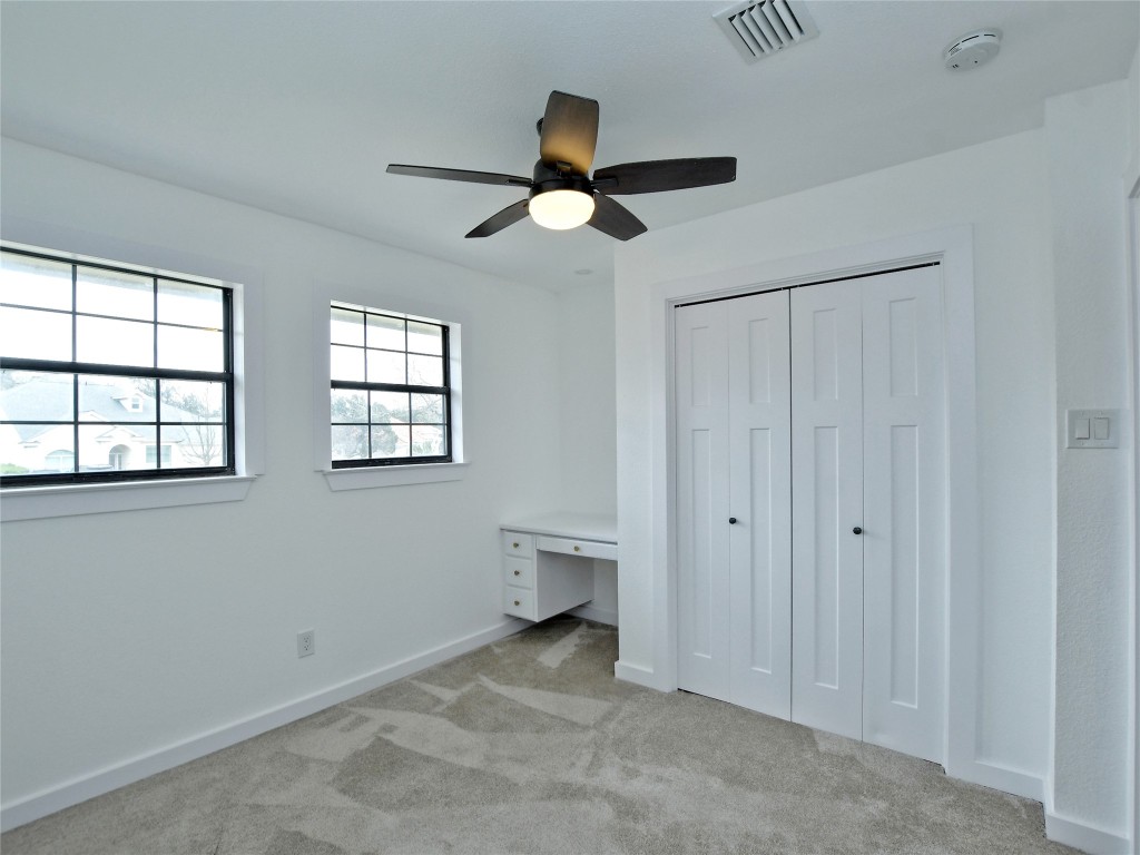 307 Copperleaf Road Lakeway, TX 78734 - Photo 13 of 28 a view of an empty room with a window