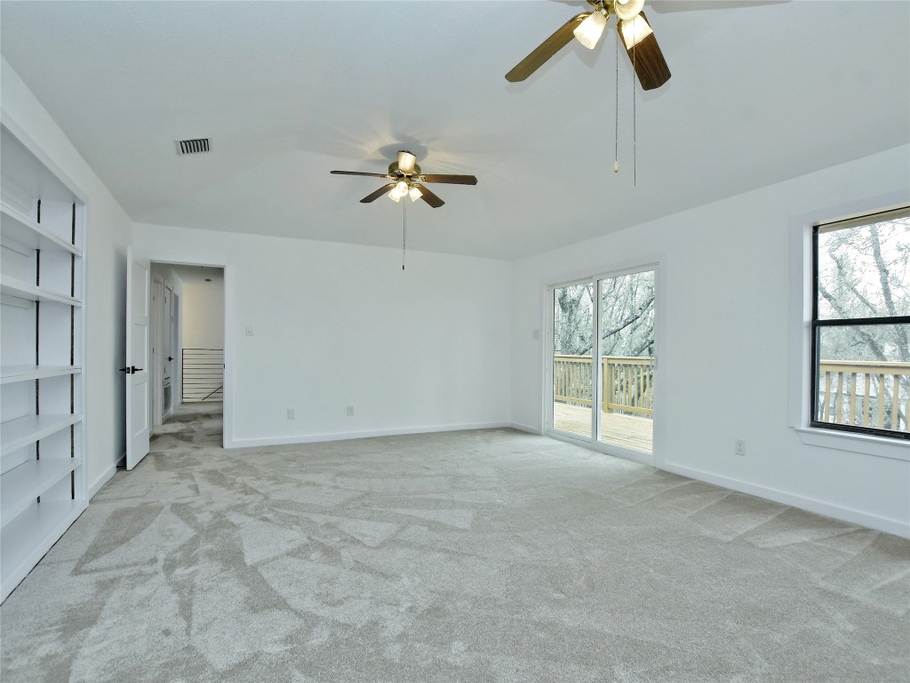 307 Copperleaf Road Lakeway, TX 78734 - Photo 17 of 28 a view of an empty room with a window