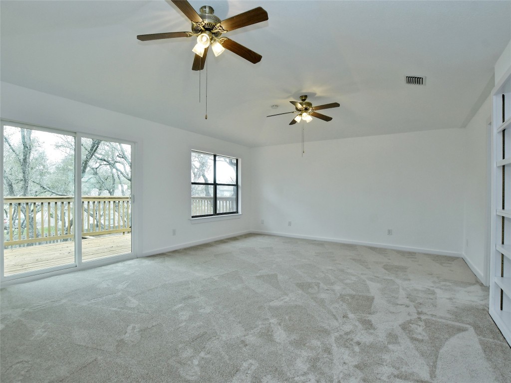 307 Copperleaf Road Lakeway, TX 78734 - Photo 18 of 28 a view of an empty room with a window
