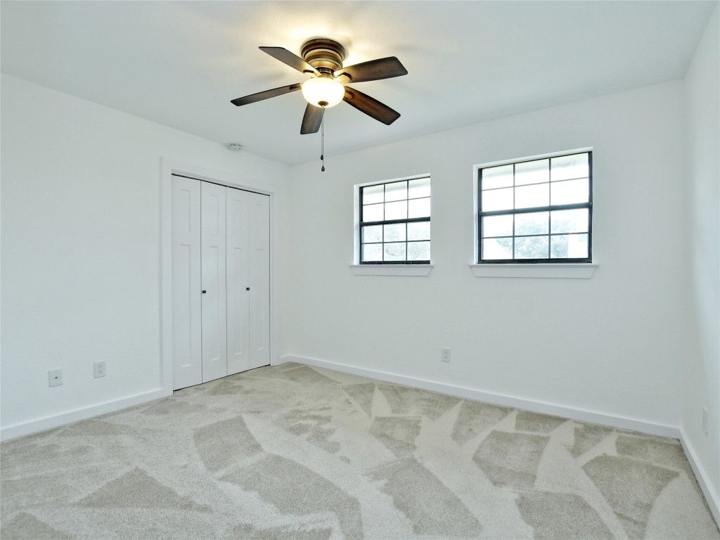 307 Copperleaf Road Lakeway, TX 78734 - Photo 24 of 28 a view of an empty room with a window