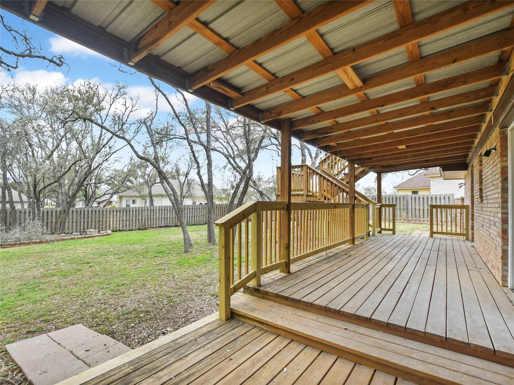 307 Copperleaf Road Lakeway, TX 78734 - Photo 27 of 28 a view of outdoor space with deck and large trees