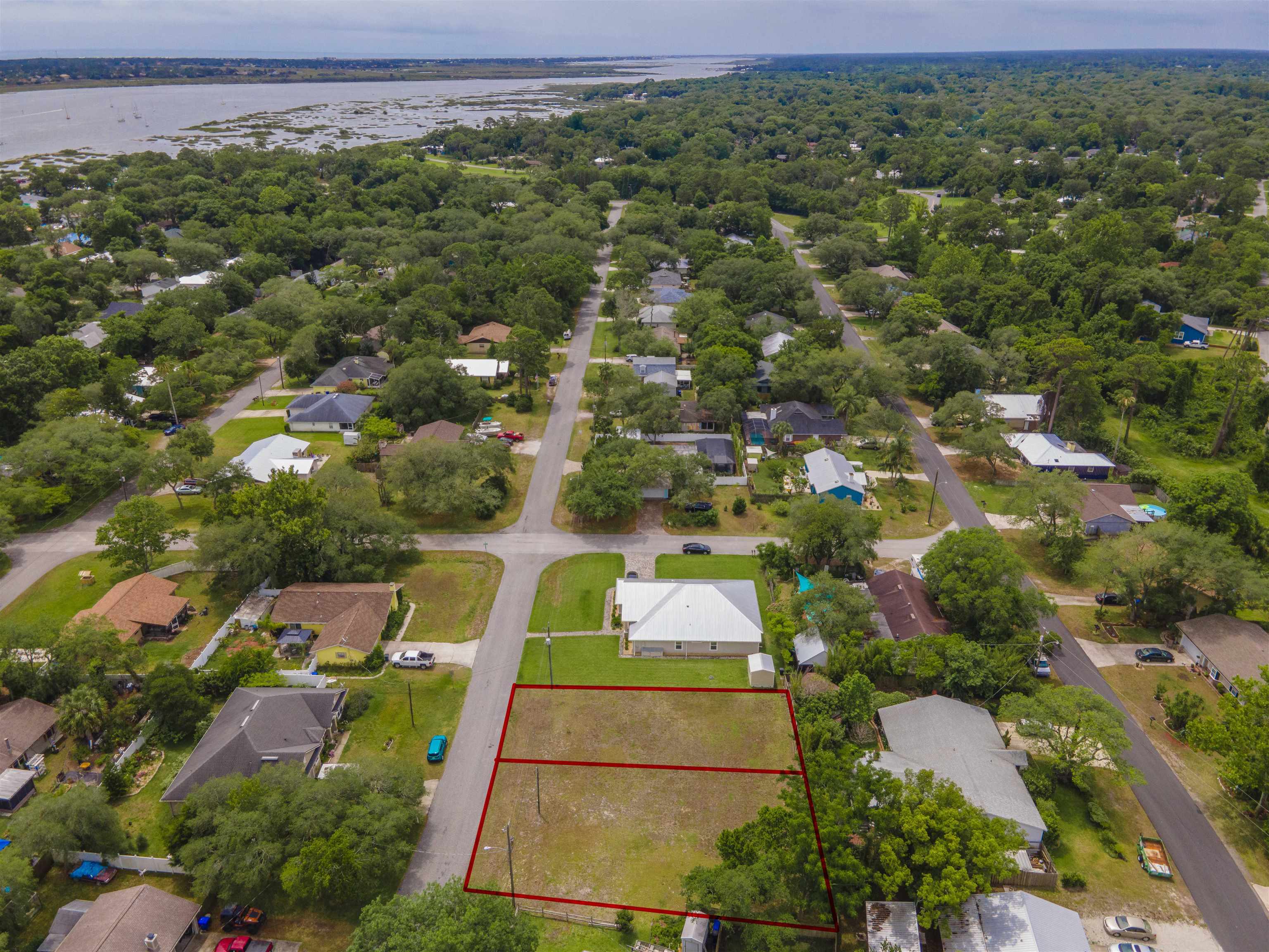 103 Sea Fox Road St. Augustine, FL 32086 - Photo 5 of 12 an aerial view of residential houses with outdoor space