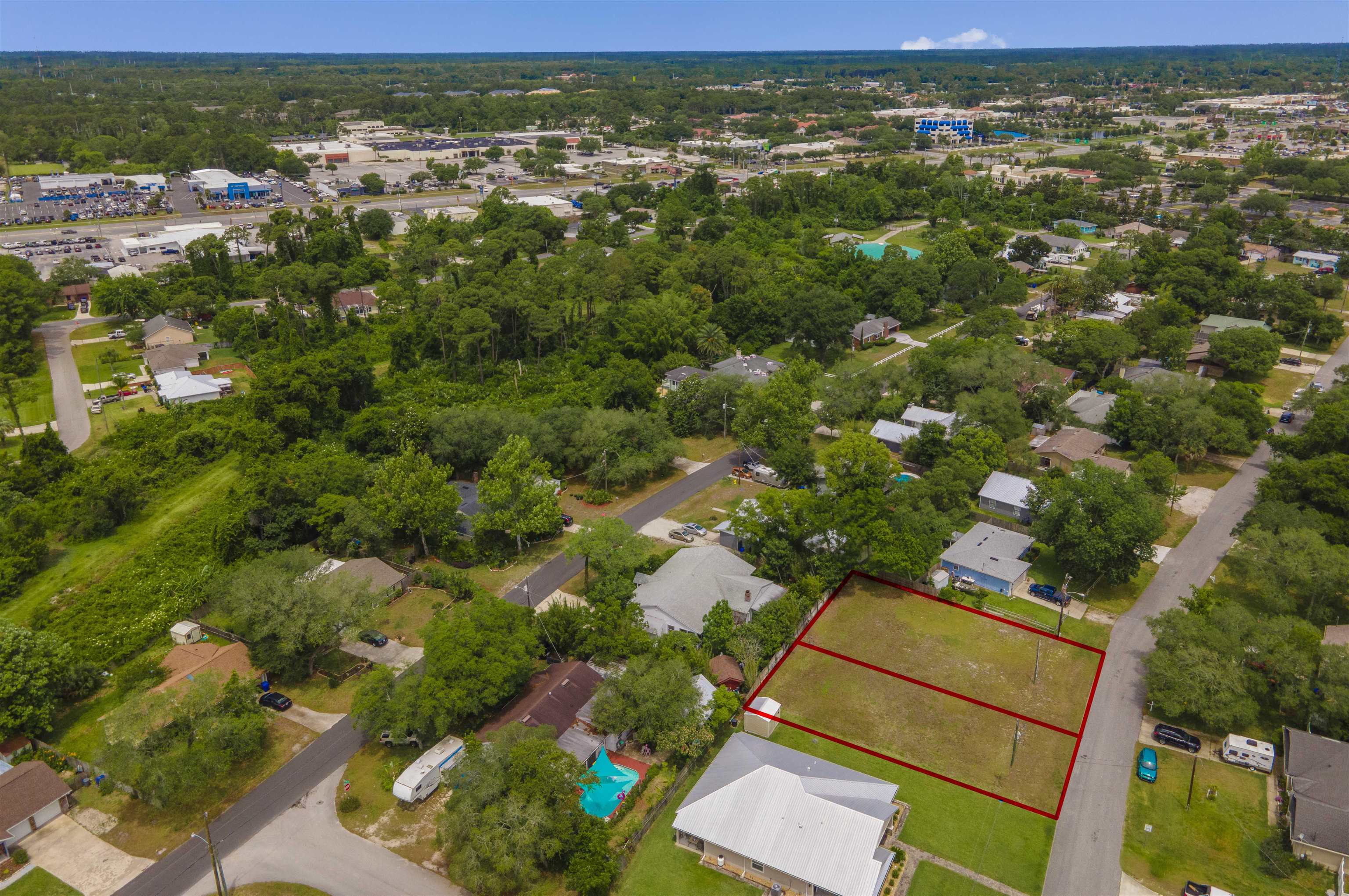 103 Sea Fox Road St. Augustine, FL 32086 - Photo 7 of 12 an aerial view of residential houses with outdoor space and trees