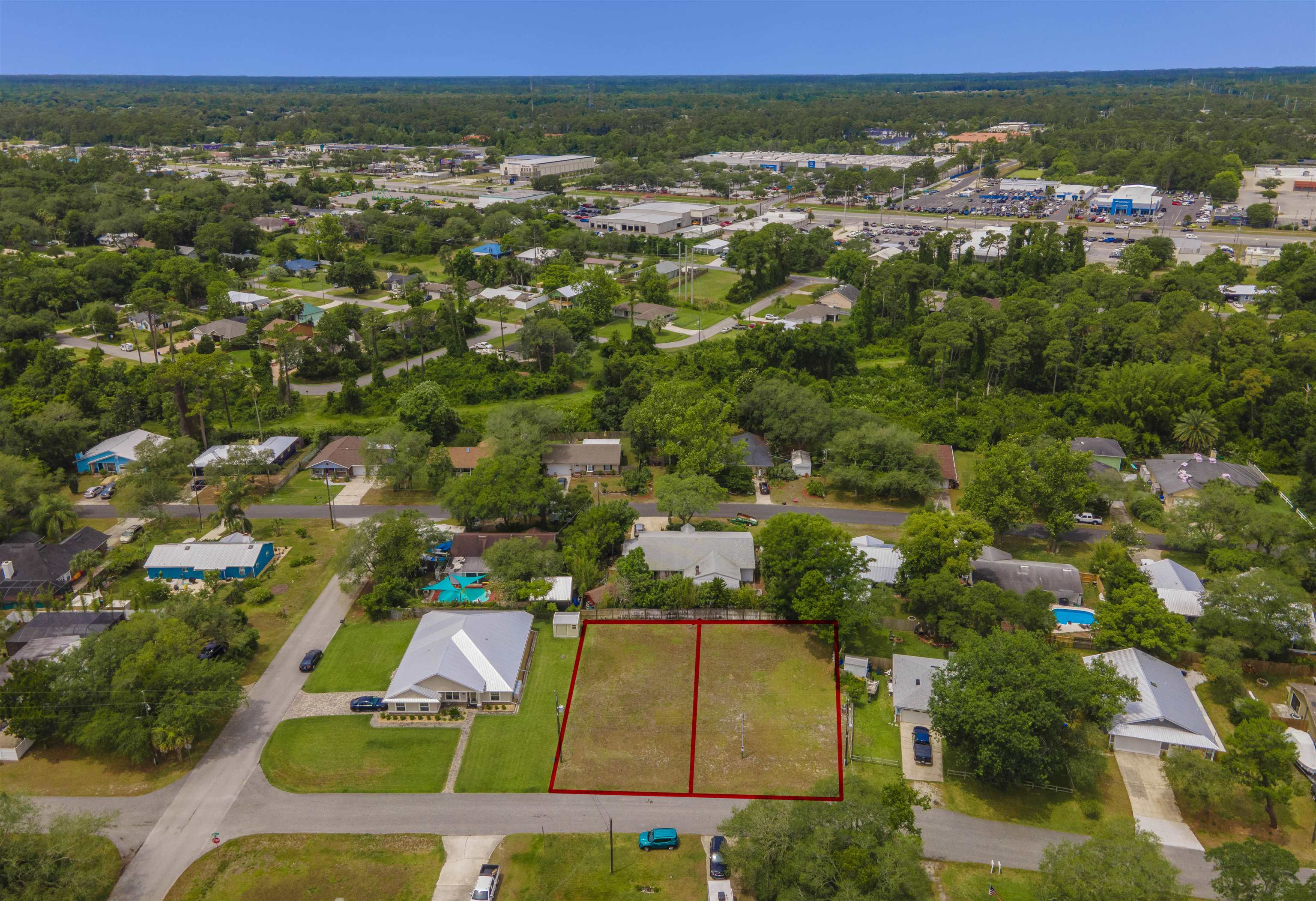 103 Sea Fox Road St. Augustine, FL 32086 - Photo 8 of 12 an aerial view of residential houses with outdoor space and trees