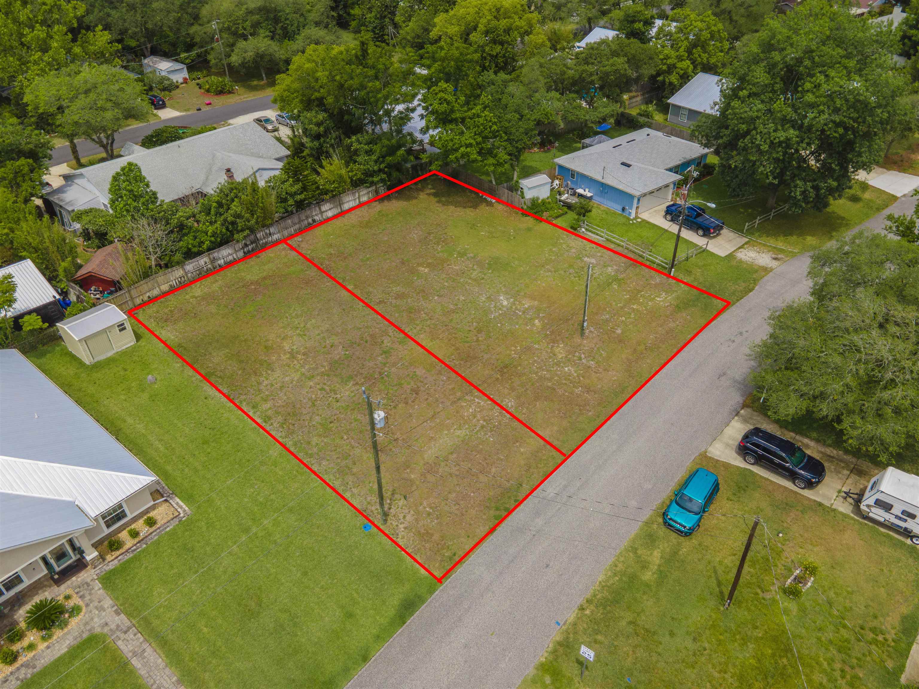 103 Sea Fox Road St. Augustine, FL 32086 - Photo 10 of 12 an aerial view of a tennis ground and a lots of palm trees