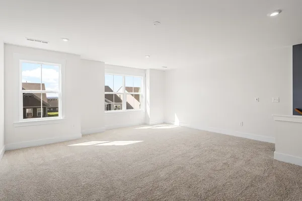 an empty room with windows