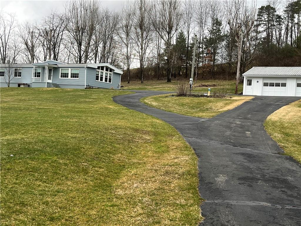 49 Cedar Grove Road Avella, PA 15312 - Photo 16 of 16 a view of a house with a swimming pool