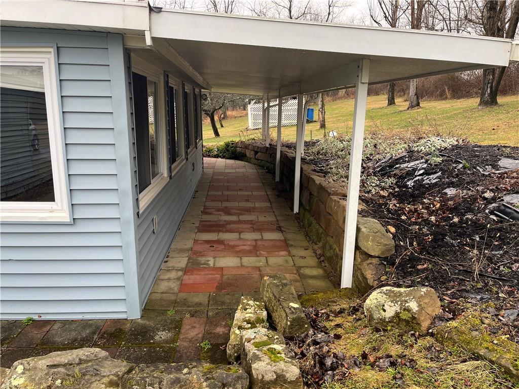 49 Cedar Grove Road Avella, PA 15312 - Photo 3 of 16 a view of a porch