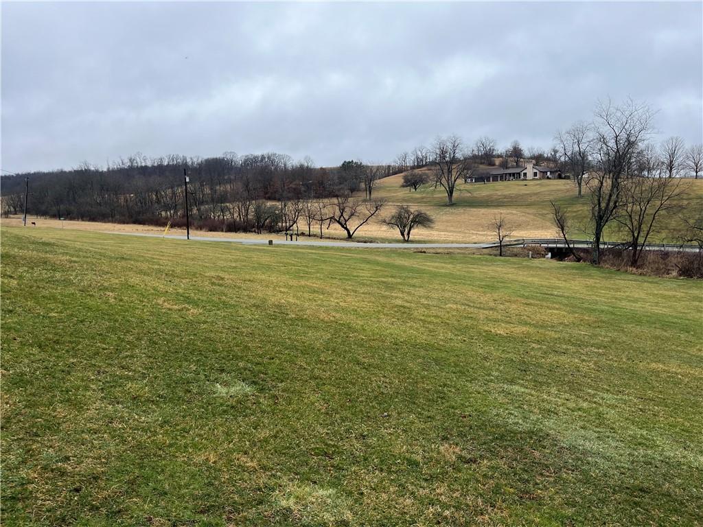 49 Cedar Grove Road Avella, PA 15312 - Photo 8 of 16 a view of a lake with houses in back