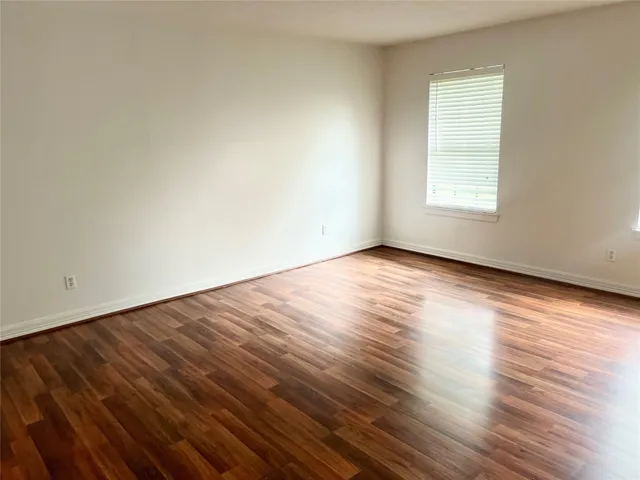 a bathroom with a toilet and a vanity