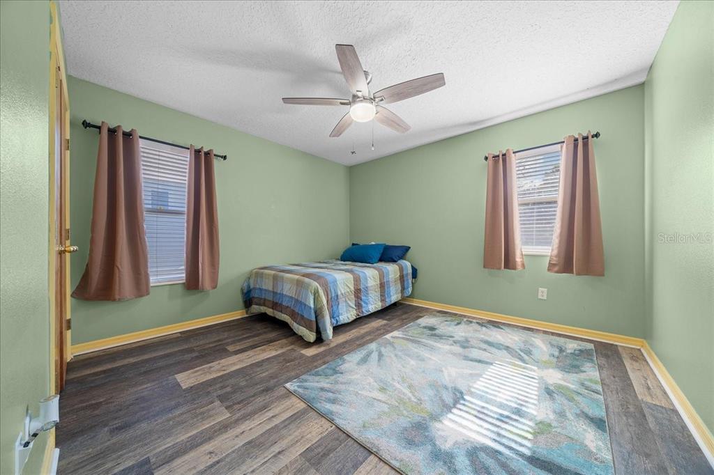 12575 West Edwards Court Inglis, FL 34449 - Photo 17 of 39 a bedroom with a bed and a window