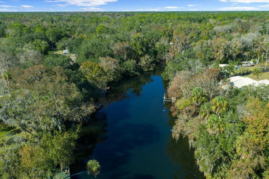 12575 West Edwards Court Inglis, FL 34449 - Photo 37 of 39 a view of a lake with a yard