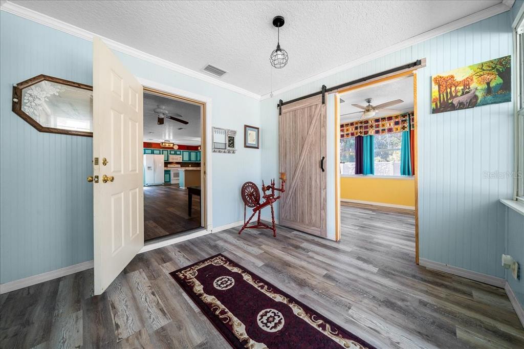 12575 West Edwards Court Inglis, FL 34449 - Photo 4 of 39 a very nice looking room with a large window