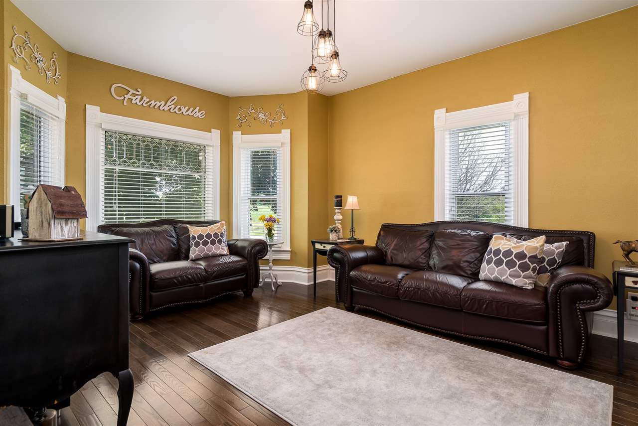 9691 East Cedarville Road Davis, IL 61019 - Photo 14 of 39 a living room with furniture and a large window