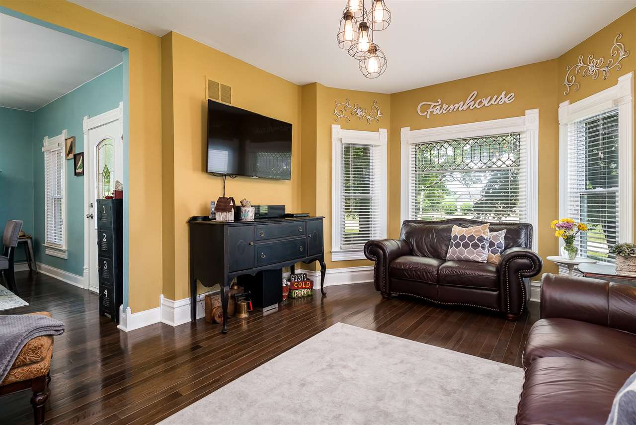 9691 East Cedarville Road Davis, IL 61019 - Photo 15 of 39 a living room with furniture and a flat screen tv