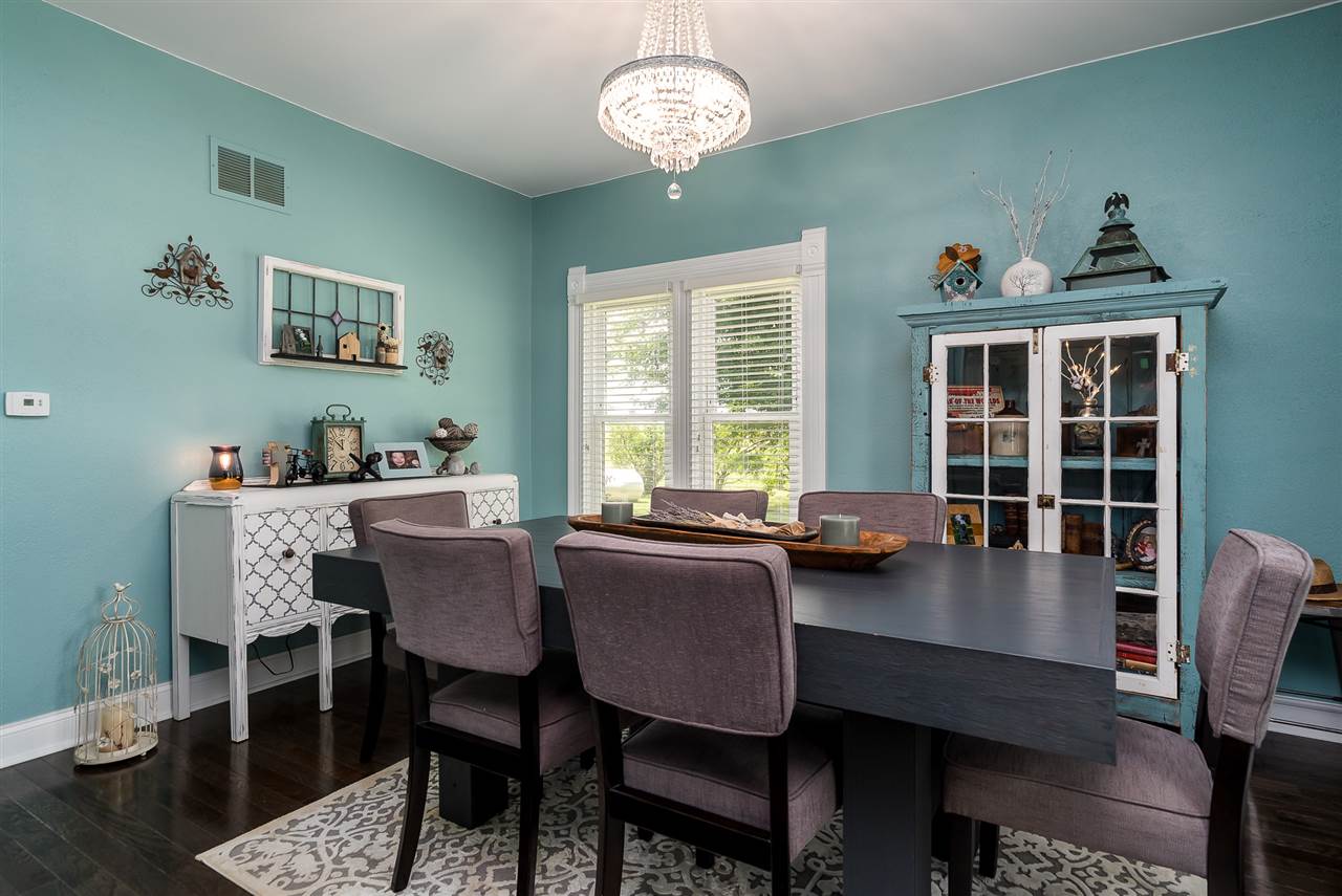 9691 East Cedarville Road Davis, IL 61019 - Photo 18 of 39 a dining room with wooden floor and breakfast area