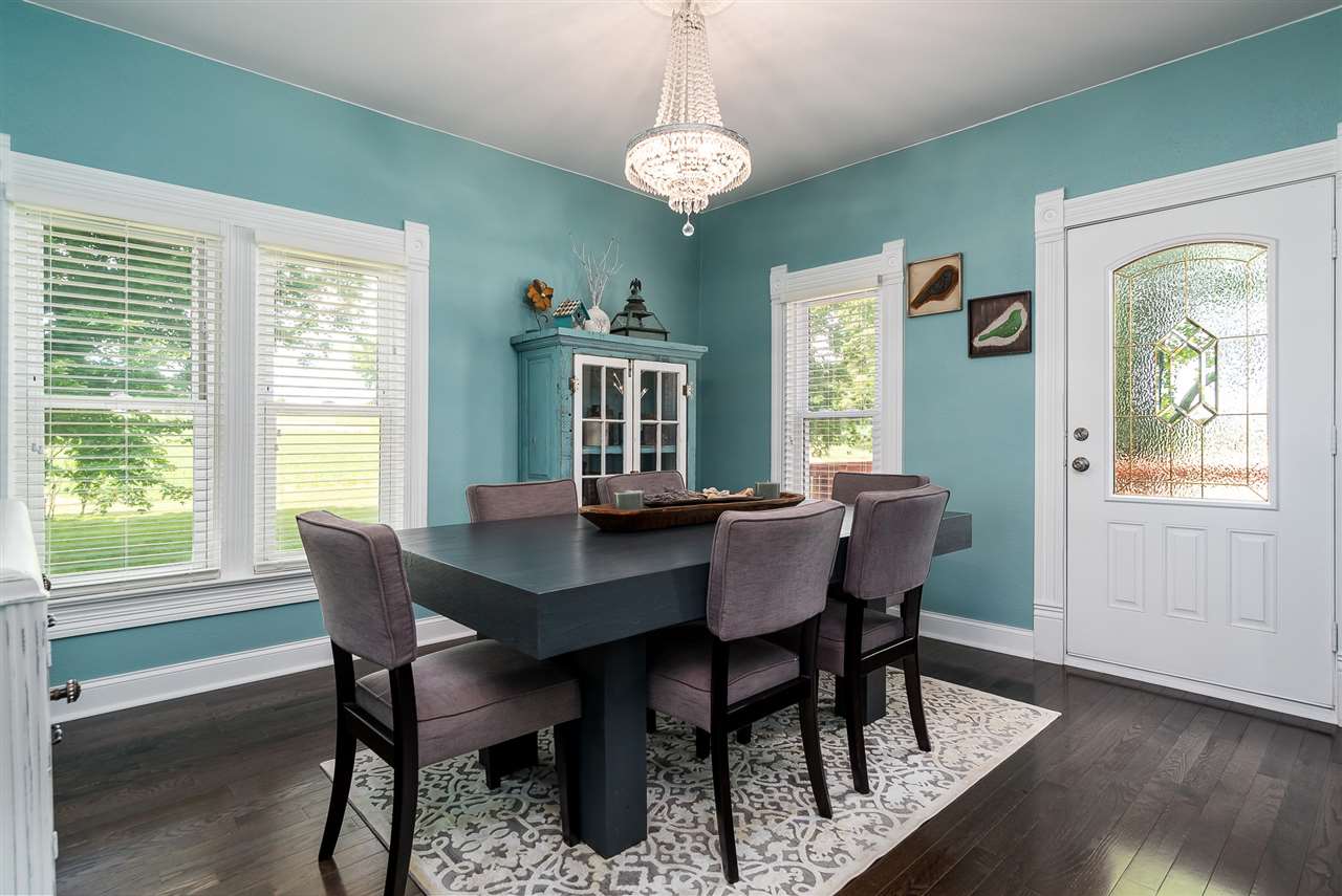 9691 East Cedarville Road Davis, IL 61019 - Photo 19 of 39 a view of a dining room with furniture window and wooden floor