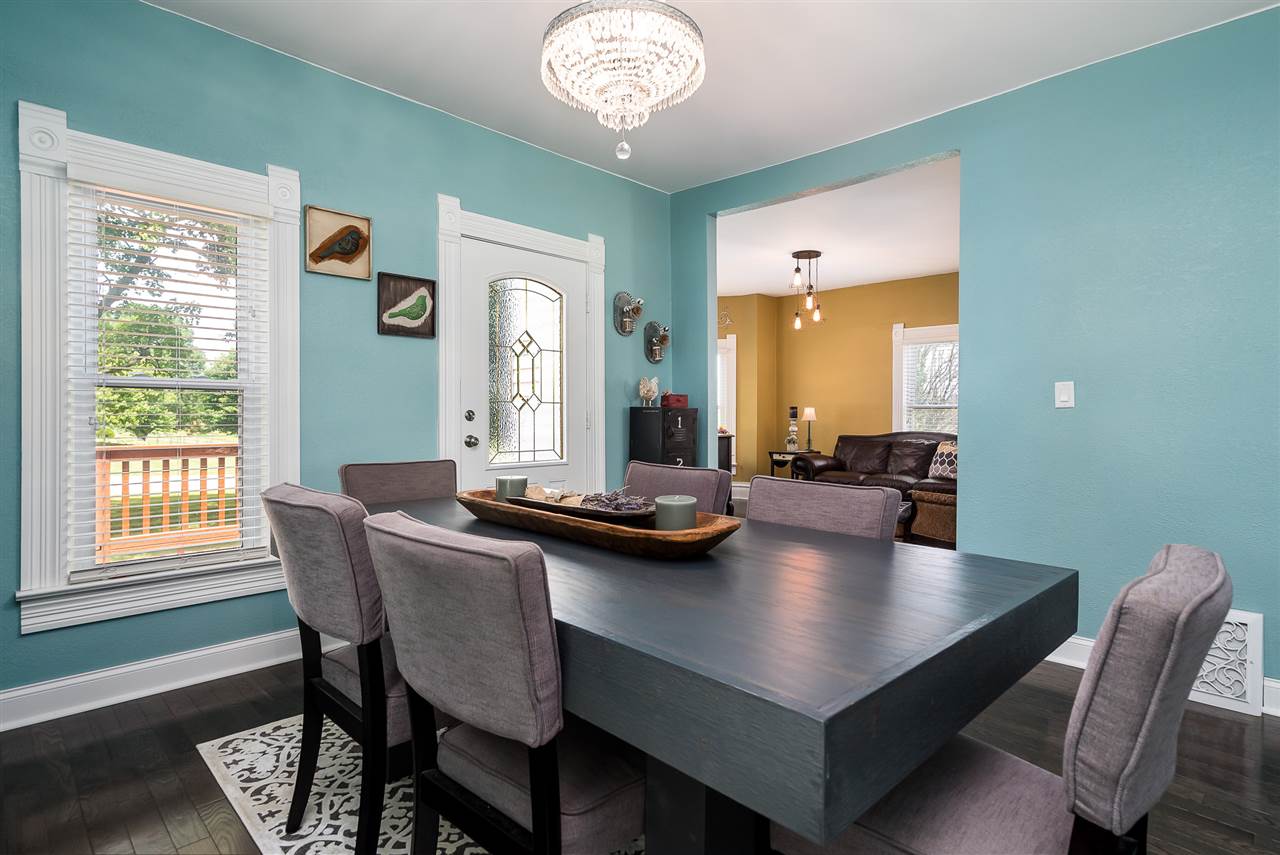 9691 East Cedarville Road Davis, IL 61019 - Photo 20 of 39 a view of a dining room with furniture and chandelier