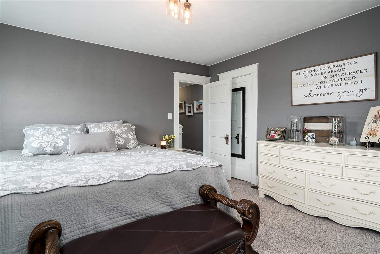 9691 East Cedarville Road Davis, IL 61019 - Photo 29 of 39 a bed room with a bed and a television