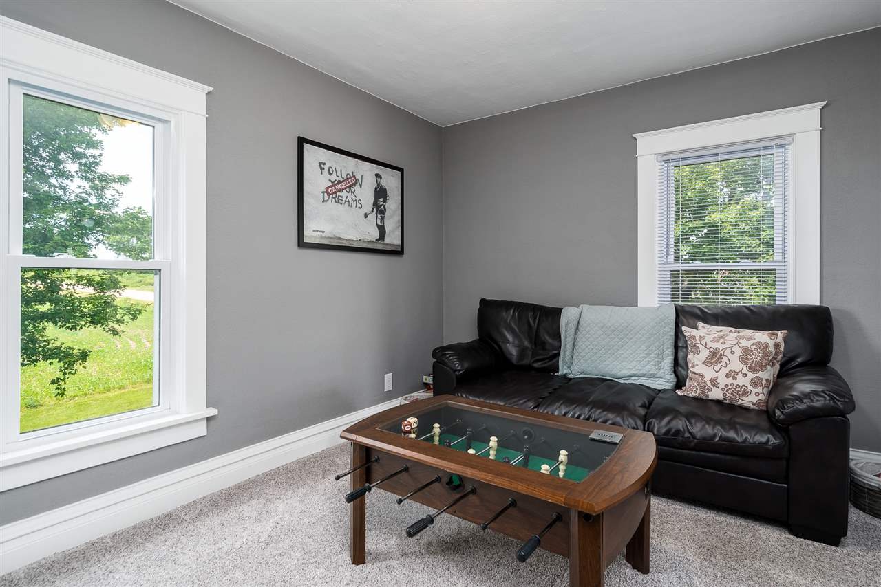 9691 East Cedarville Road Davis, IL 61019 - Photo 35 of 39 a living room with furniture and a window