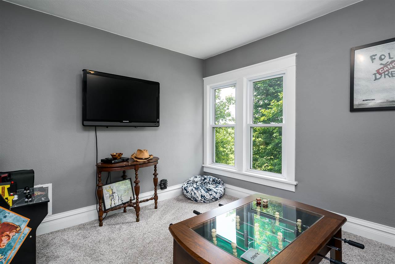 9691 East Cedarville Road Davis, IL 61019 - Photo 36 of 39 a living room with furniture and a flat screen tv
