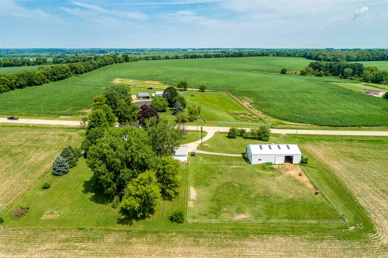 9691 East Cedarville Road Davis, IL 61019 - Photo 5 of 39 a view of a golf course with a lake