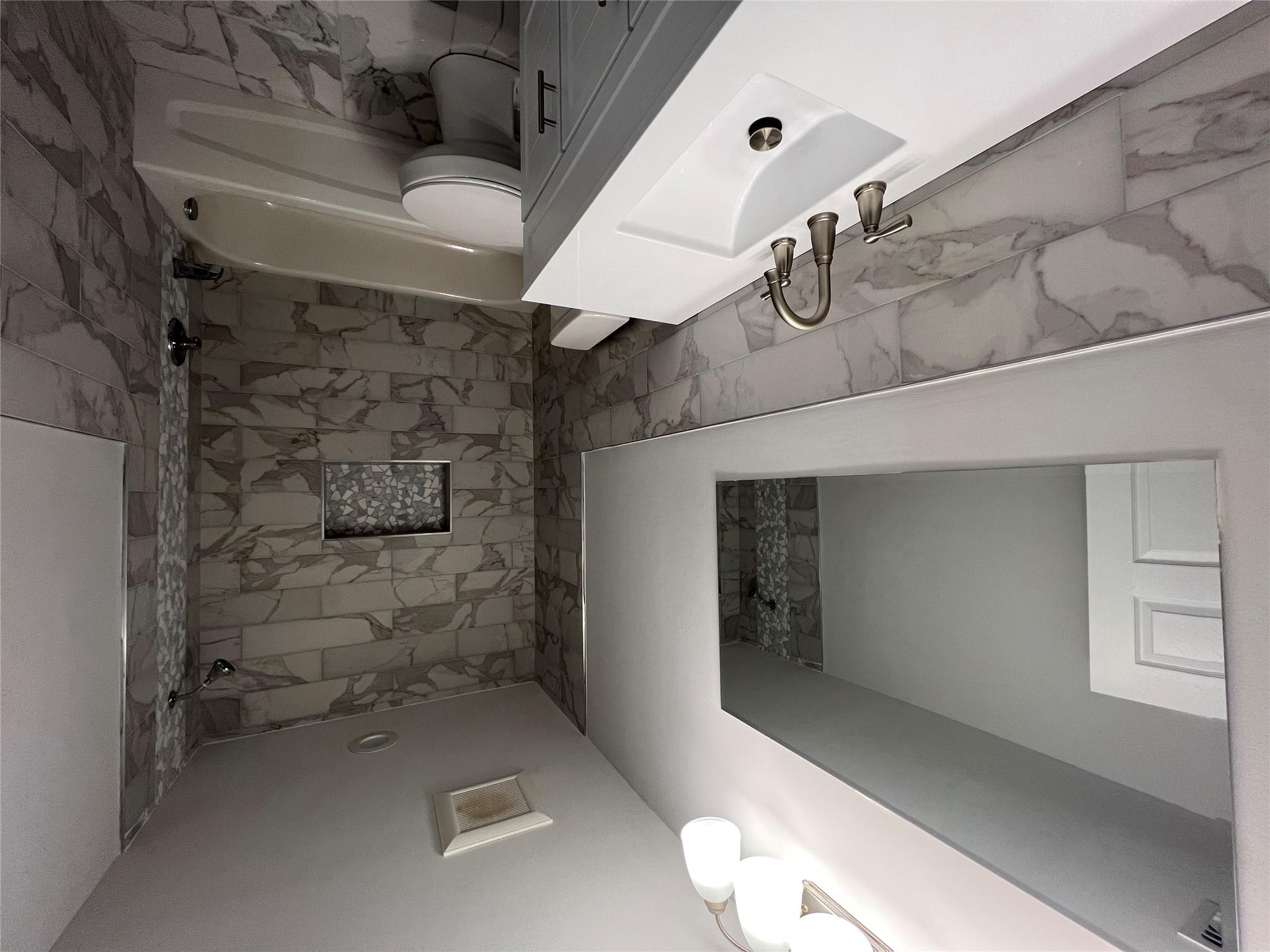 N / C Blue Point Road Farmingville, NY 11738 - Photo 13 of 16 a bathroom with a sink a toilet and shower