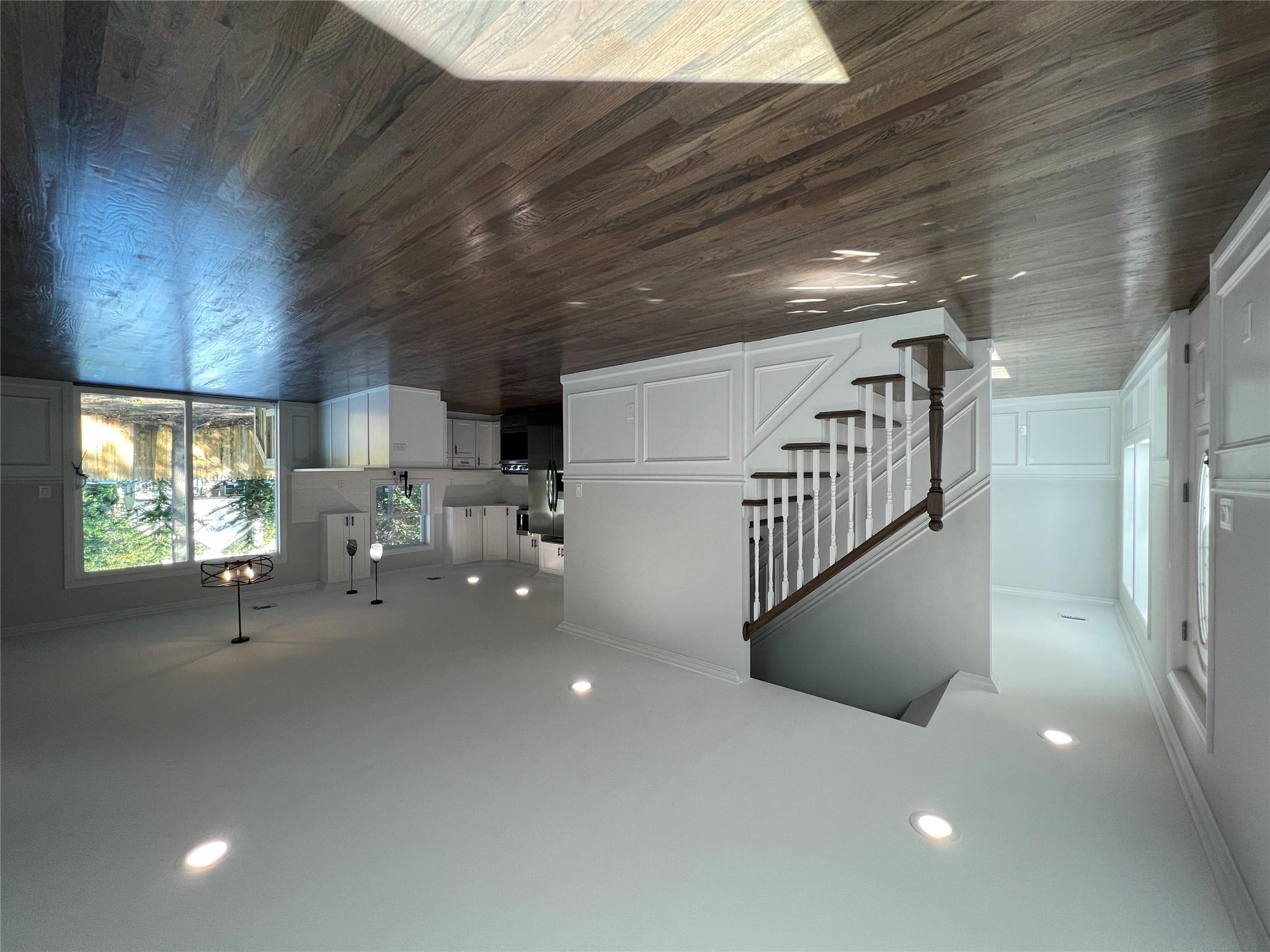 N / C Blue Point Road Farmingville, NY 11738 - Photo 2 of 16 a view of entryway and kitchen with wooden floor