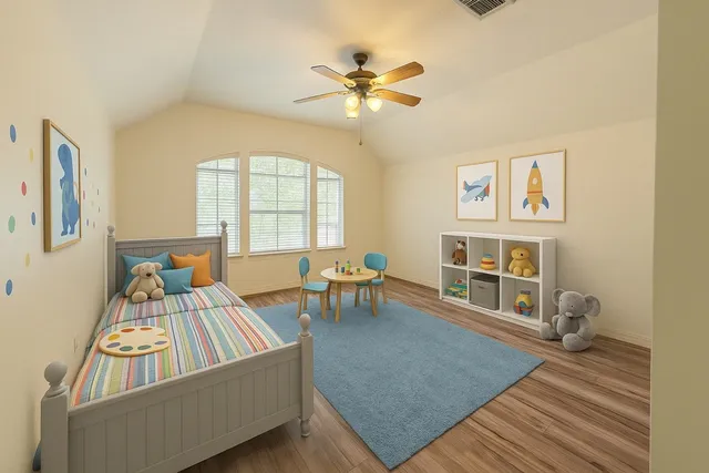 a living room with furniture and a table