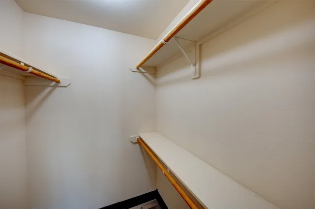 a view of small space with racks on the wall