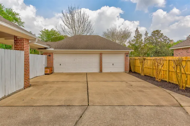 a front view of a house with a garage