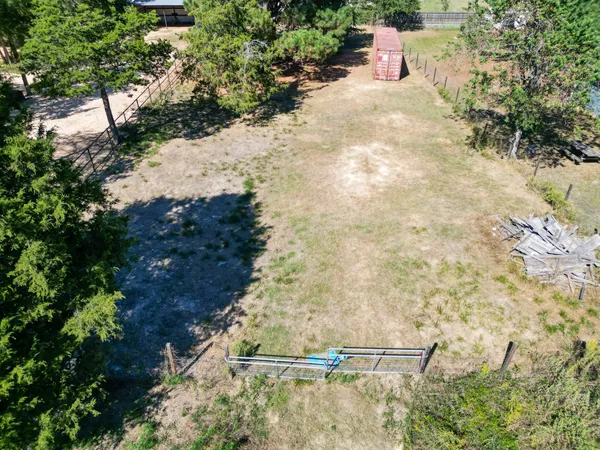 a backyard of a house with a yard