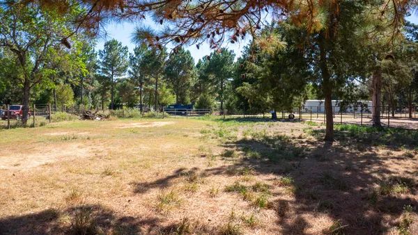 a view of road with trees