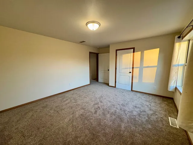 an empty room with window