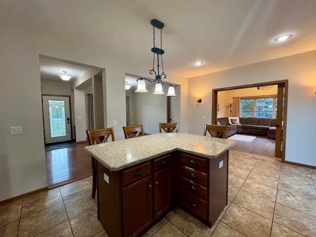 a kitchen with a stove and a sink