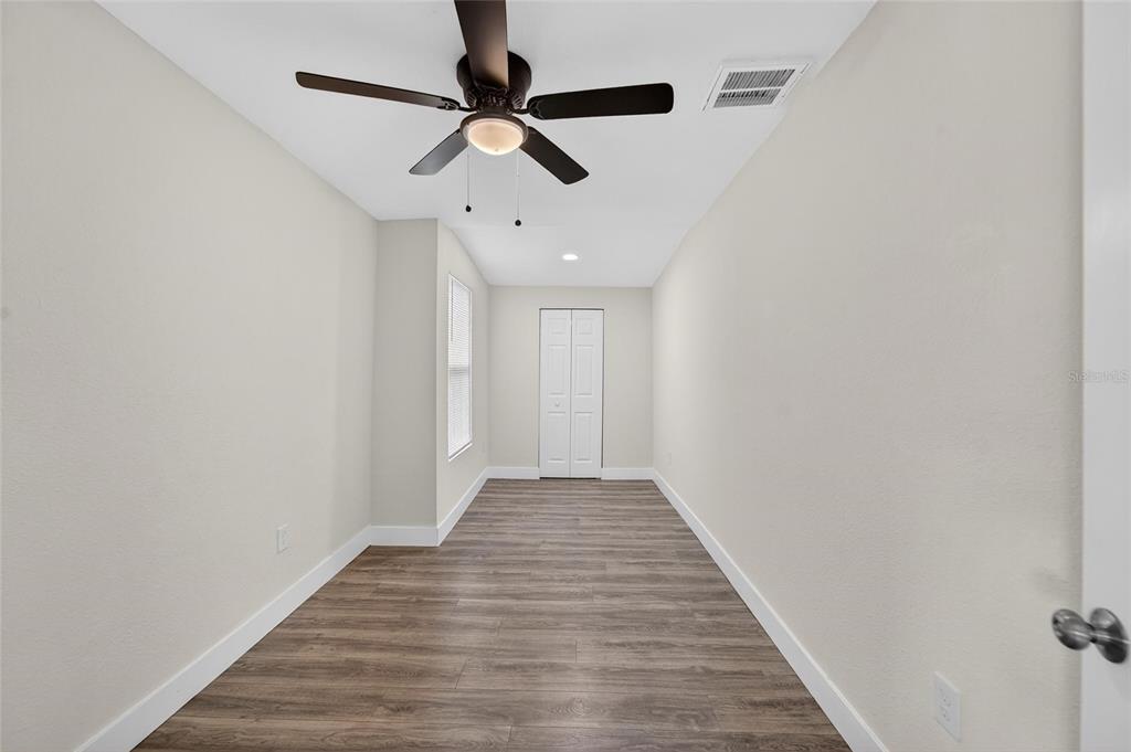 2525 West Beach Street Tampa, FL 33607 - Photo 22 of 48 a view of a hallway with wooden floor