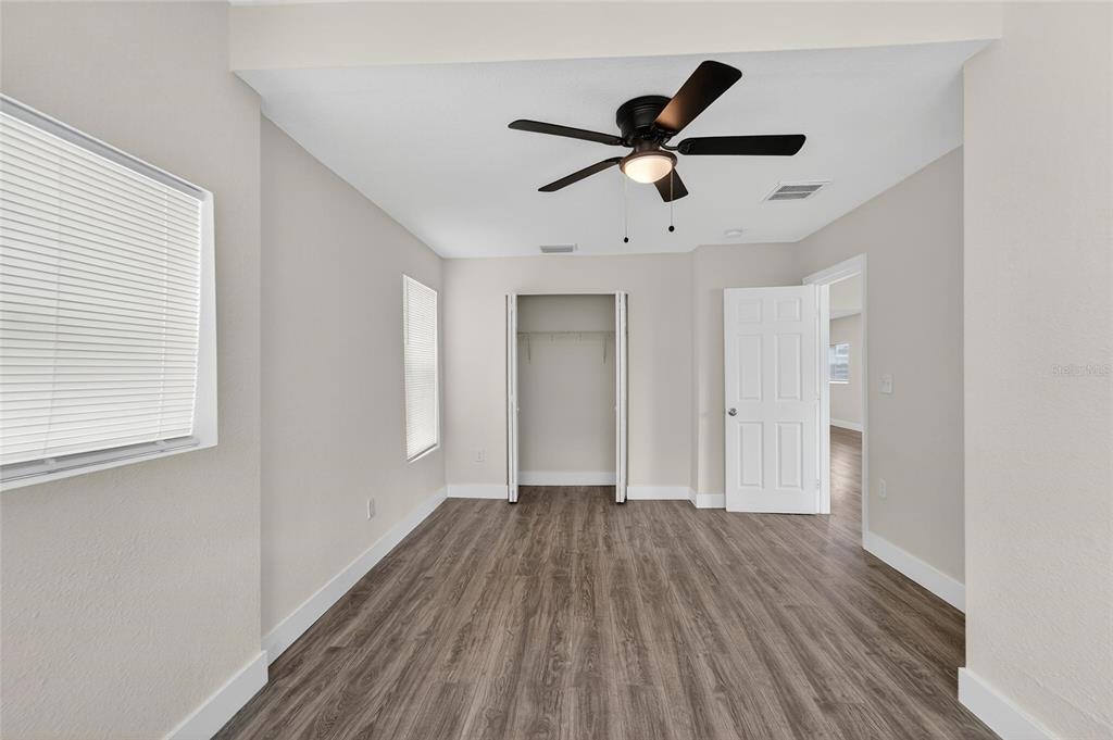 2525 West Beach Street Tampa, FL 33607 - Photo 27 of 48 a view of empty room with wooden floor and window