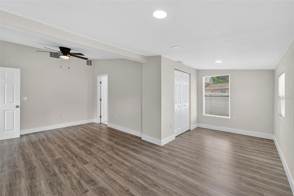 2525 West Beach Street Tampa, FL 33607 - Photo 33 of 48 wooden floor in an empty room with a window