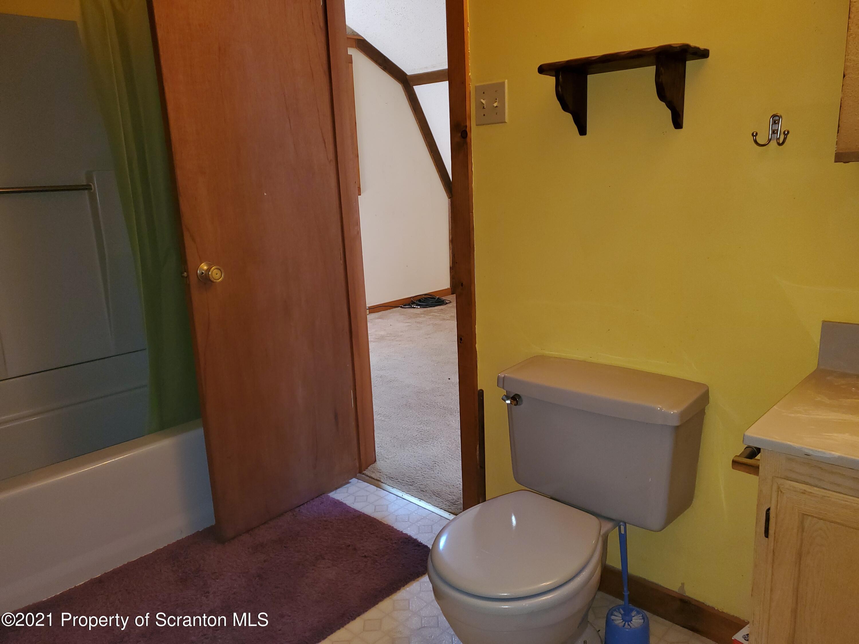 1280 Mitchell Road Montrose, PA 18801 - Photo 23 of 28 a bathroom with a toilet and a shower