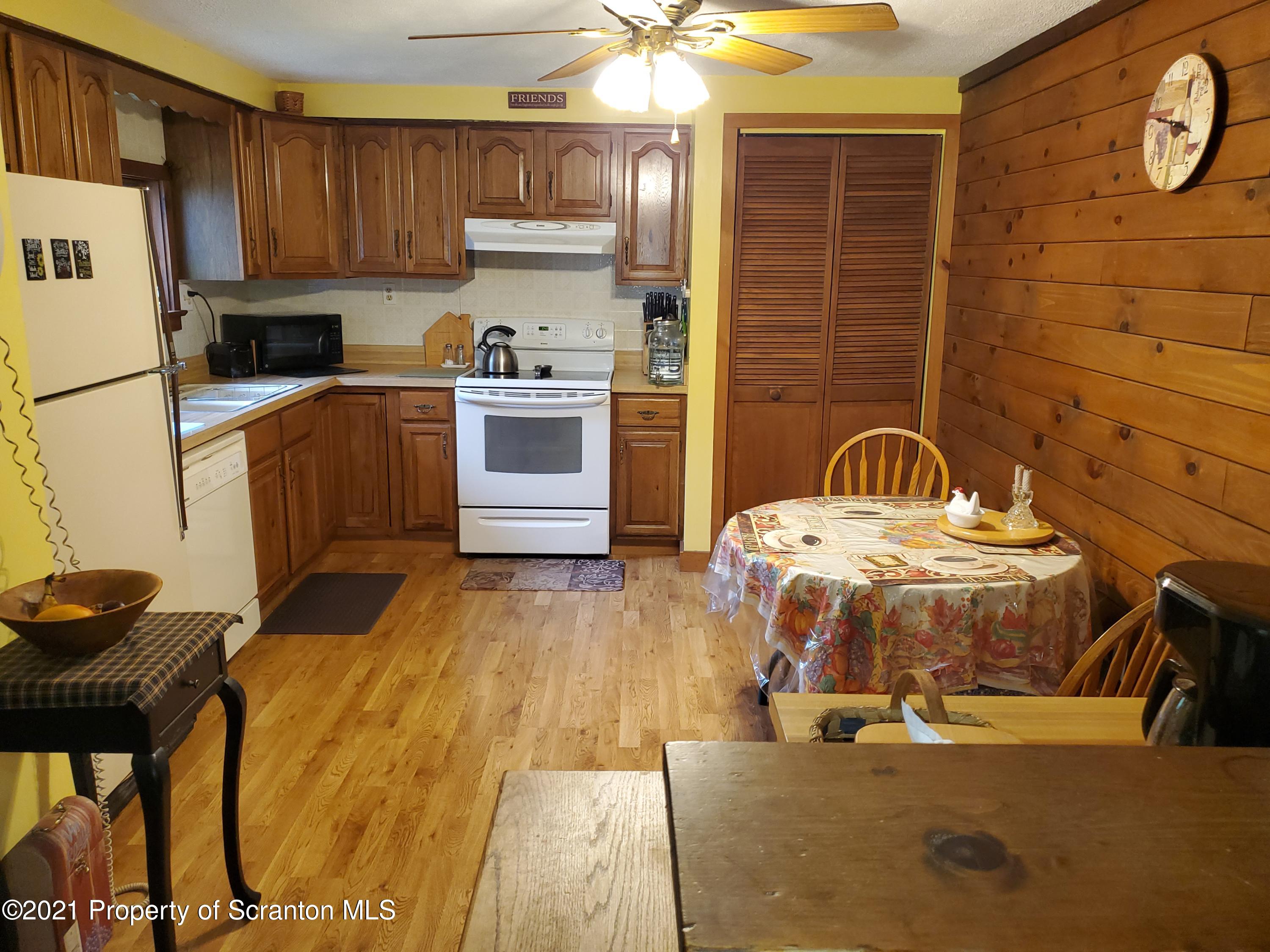 1280 Mitchell Road Montrose, PA 18801 - Photo 8 of 28 a kitchen with a sink appliances and cabinets
