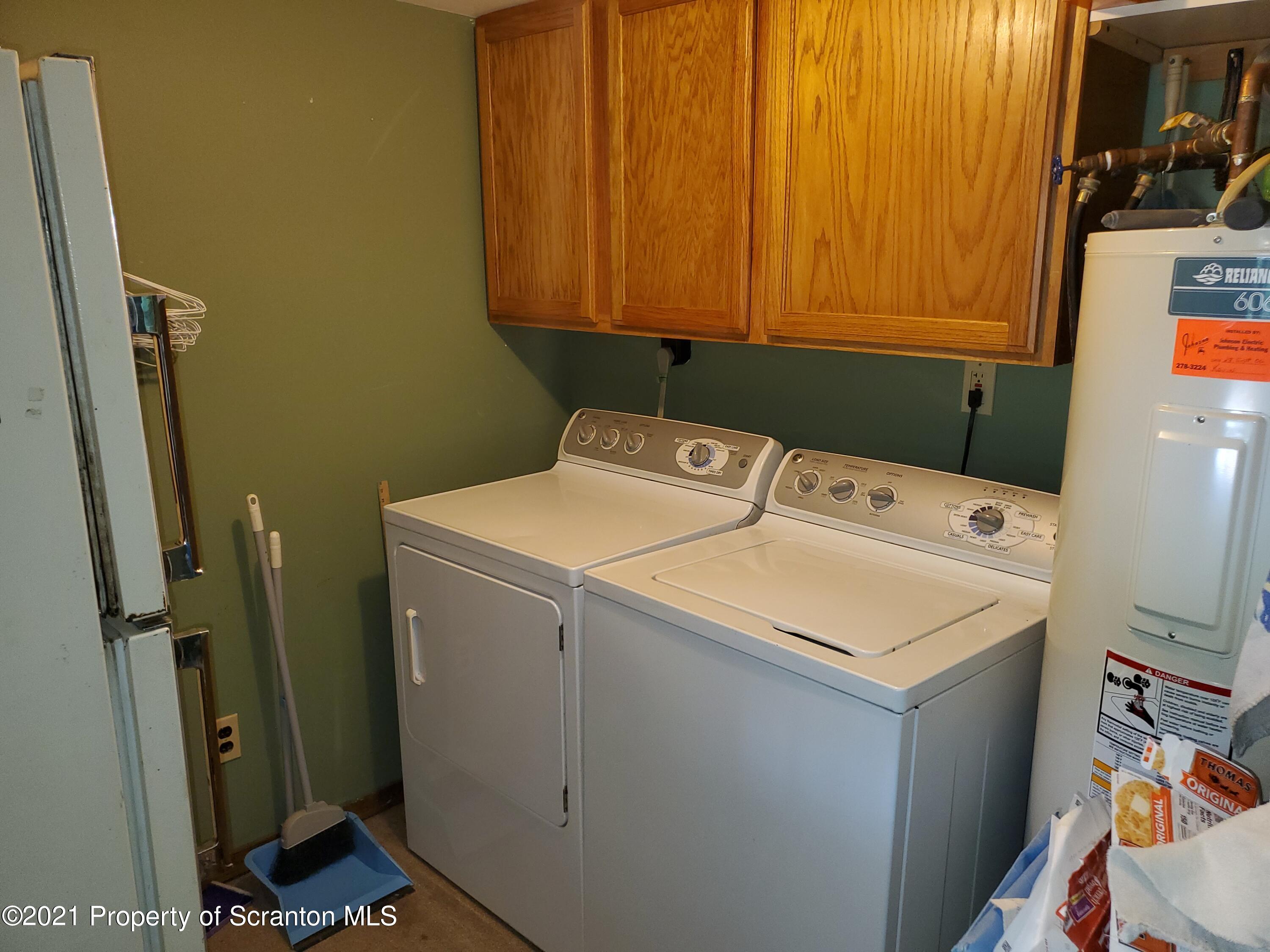 1280 Mitchell Road Montrose, PA 18801 - Photo 9 of 28 a utility room with dryer and washer