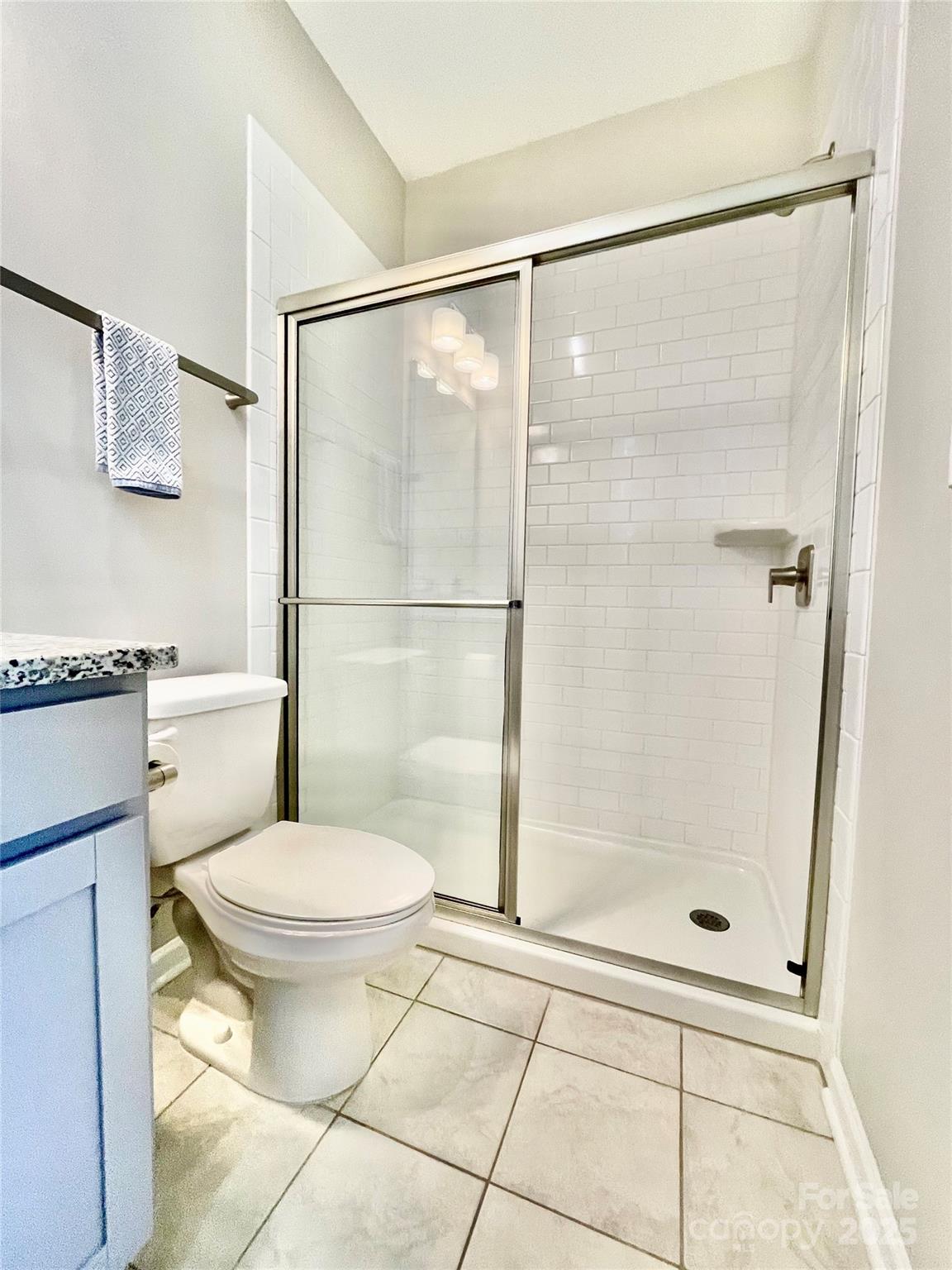 278 West Waterlynn Road Mooresville, NC 28117 - Photo 21 of 46 a bathroom with a shower a toilet and a sink