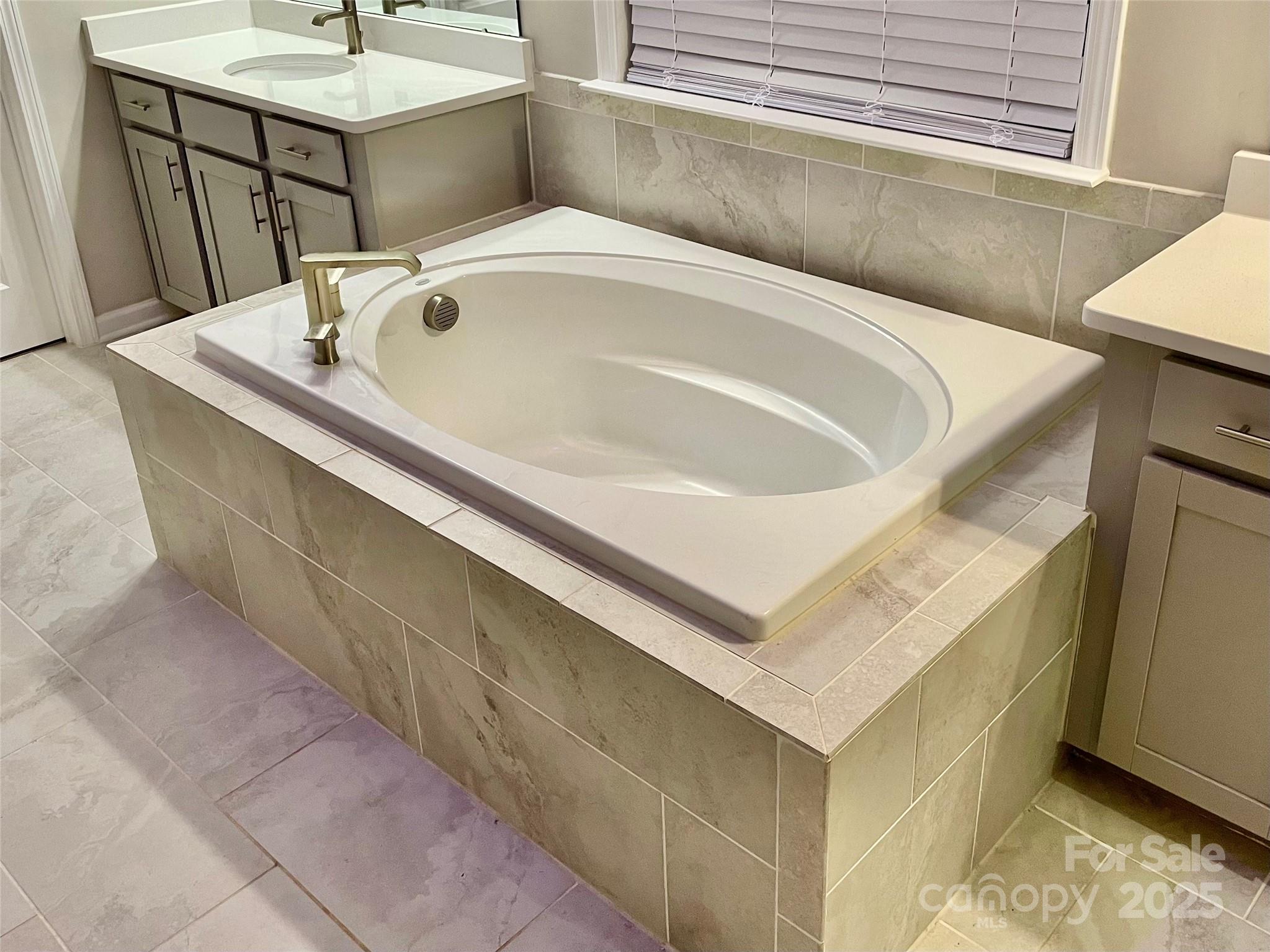 278 West Waterlynn Road Mooresville, NC 28117 - Photo 30 of 46 a bath tub sitting next to a white sink