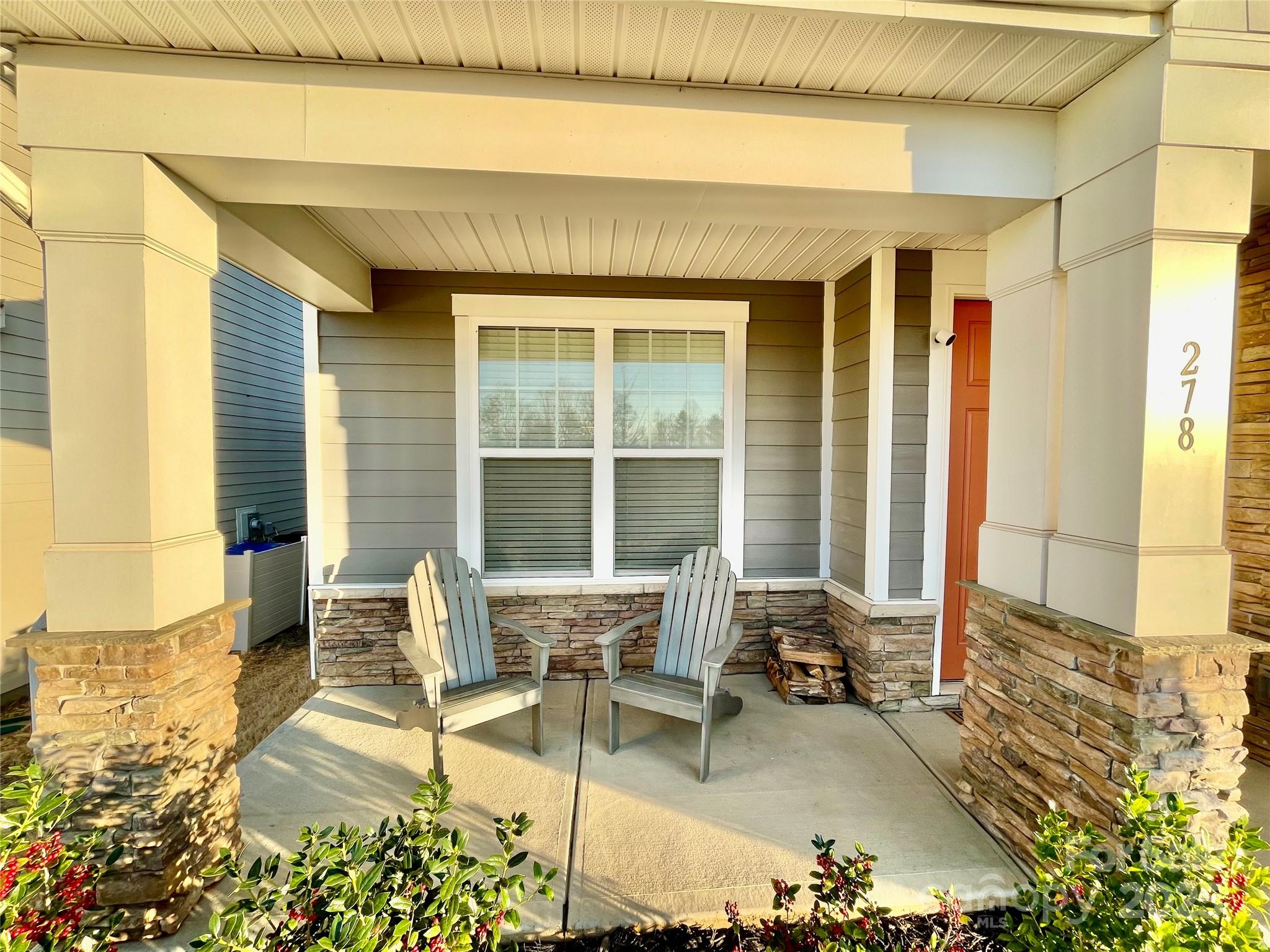 278 West Waterlynn Road Mooresville, NC 28117 - Photo 3 of 46 a building outdoor space with patio furniture